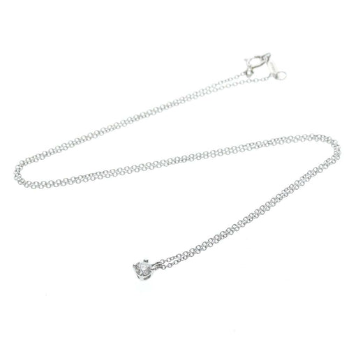 Tiffany & Co. - Pendentif solitaire en platine avec diamant taille émeraude 58 Facettes omov5bs64b