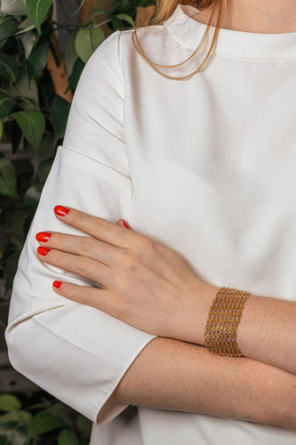 Bracelet - Maille drapée en or rose et jaune 18 carats 58 Facettes 5765271CN