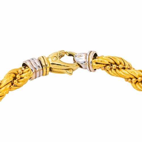 Bracelet - Maille torsadée en or jaune 750 58 Facettes 5955638CN