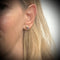 Boucles d'oreilles Boucles d'oreilles en or jaune 750 et tanzanites 58 Facettes Z1351820