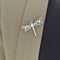 Broche Broche libellule en or blanc 750 avec diamants et pierres fines 58 Facettes Z15B51737