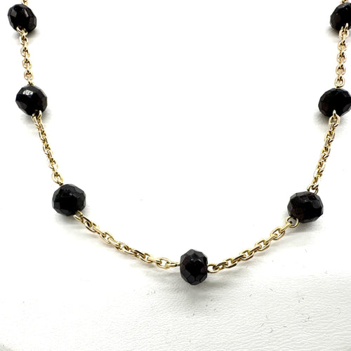 Collier Collier en or jaune 750 et grenats 58 Facettes Z15B51717
