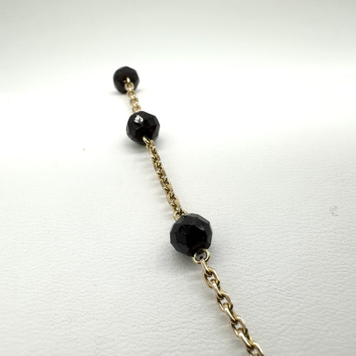 Collier Collier en or jaune 750 et grenats 58 Facettes Z15B51717