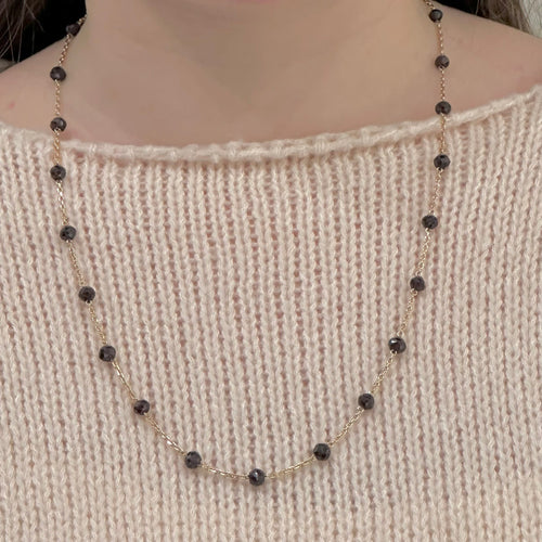 Collier Collier en or jaune 750 et grenats 58 Facettes Z15B51717
