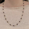 Collier Collier en or jaune 750 et grenats 58 Facettes Z15B51717