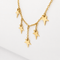 Collier Collier à pampilles étoiles en or jaune 58 Facettes 24802