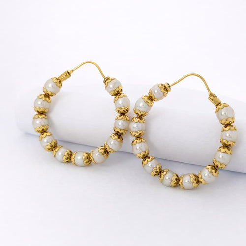 Boucles d'oreilles Boucles d'oreilles créoles en or jaune 18 carats et perles 58 Facettes 27556
