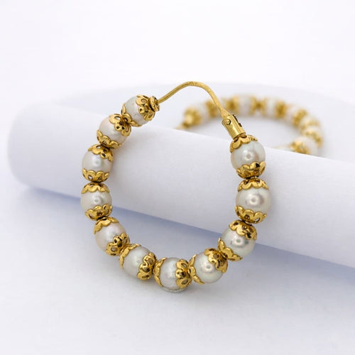 Boucles d'oreilles Boucles d'oreilles créoles en or jaune 18 carats et perles 58 Facettes 27556