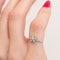 Bague 48 Bague fleur en or blanc et diamants 58 Facettes 30091