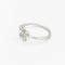 Bague 48 Bague fleur en or blanc et diamants 58 Facettes 30091