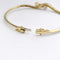 Bracelet Bracelet jonc en or jaune avec diamants, rubis et émeraudes 58 Facettes 31215