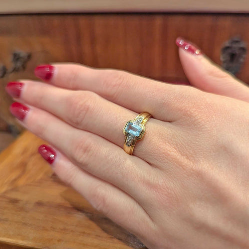 Bague 57 Bague en or jaune avec aigue-marine et diamants 58 Facettes 32640