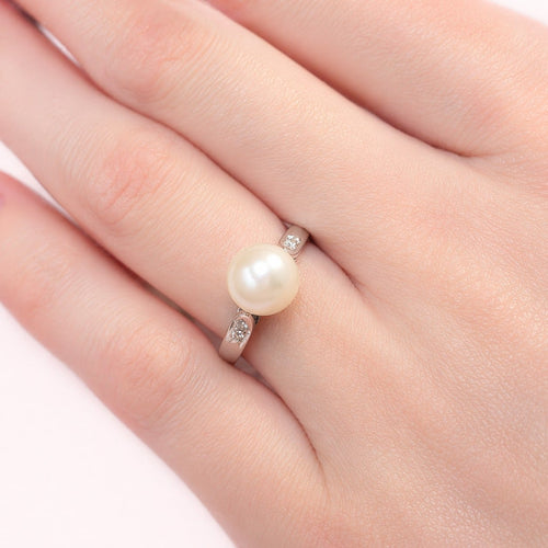 Bague 51 Bague en or blanc, perle de culture et diamants 58 Facettes 32599