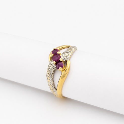 Bague 53 Bague croisée en or jaune, or blanc, diamants et rubis 58 Facettes 32235
