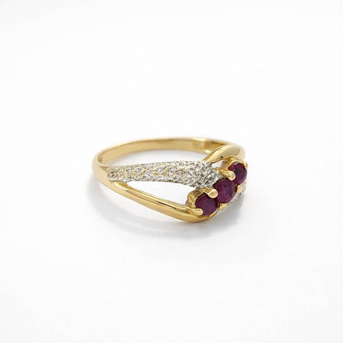 Bague 53 Bague croisée en or jaune, or blanc, diamants et rubis 58 Facettes 32235