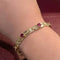 Bracelet Bracelet en or jaune 18 carats, diamants et rubis 58 Facettes 33374