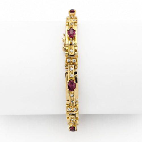 Bracelet Bracelet en or jaune 18 carats, diamants et rubis 58 Facettes 33374