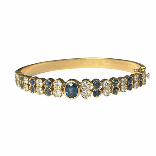 Bracelet Bracelet Jonc - Bracelet serti de saphirs et diamants en or jaune 18 carats 58 Facettes 339