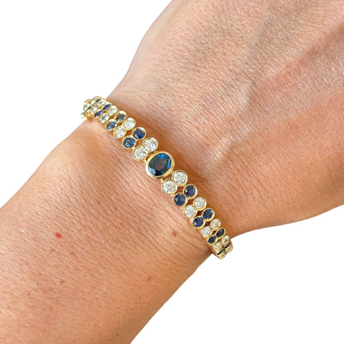 Bracelet Bracelet Jonc - Bracelet serti de saphirs et diamants en or jaune 18 carats 58 Facettes 339