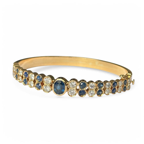 Bracelet Bracelet Jonc - Bracelet serti de saphirs et diamants en or jaune 18 carats 58 Facettes 339
