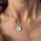 Collier Collier - Pendentif fleur en or blanc 750 et diamants 58 Facettes 15146