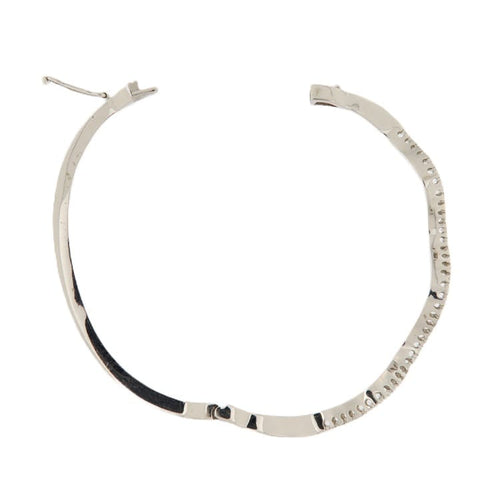 Bracelet Guidetti - Bracelet rigide en or blanc et diamants 58 Facettes G3294