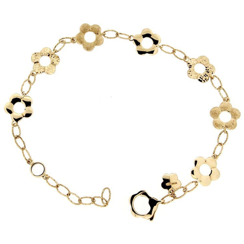 Bracelet Guidetti - Bracelet à fleurs travaillées en or jaune 58 Facettes G1391