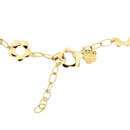 Bracelet Guidetti - Bracelet à fleurs travaillées en or jaune 58 Facettes G1391