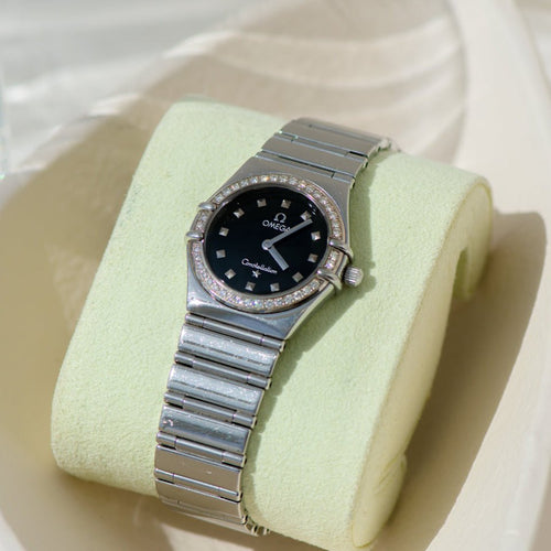 Montre Omega Constellation - Montre femme en acier inoxydable avec lunette diamantée 58 Facettes 1923