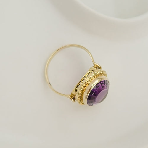 Bague 67 Bague vintage en or jaune 14K avec améthyste ovale 58 Facettes 3135