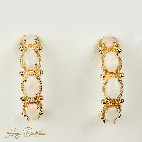 Boucles d'oreilles Boucles d’oreilles vintage en or jaune 14 carats aux opales 58 Facettes 2870