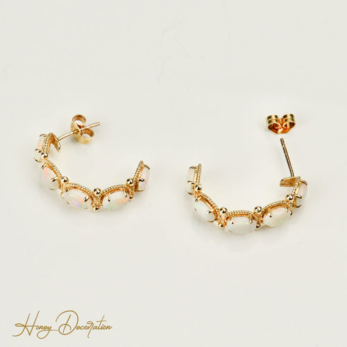 Boucles d'oreilles Boucles d’oreilles vintage en or jaune 14 carats aux opales 58 Facettes 2870