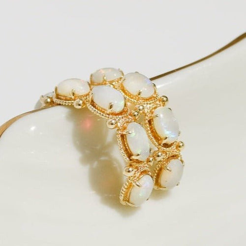 Boucles d'oreilles Boucles d’oreilles vintage en or jaune 14 carats aux opales 58 Facettes 2870