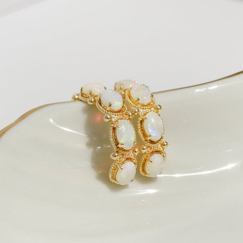 Boucles d'oreilles Boucles d’oreilles vintage en or jaune 14 carats aux opales 58 Facettes 2870