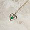Collier Chaîne en or blanc 14 carats avec pendentif cœur, diamants et émeraude 58 Facettes 2743