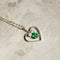 Collier Chaîne en or blanc 14 carats avec pendentif cœur, diamants et émeraude 58 Facettes 2743