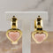 Boucles d'oreilles Créoles en or jaune 18 carats avec insert en corail 58 Facettes 2515