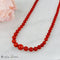 Collier Collier en corail avec fermoir en or jaune 18 carats 58 Facettes 2523