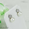 Boucles d'oreilles Boucles d'oreilles puces en or blanc 585 avec perles et diamants 58 Facettes 2305