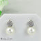 Boucles d'oreilles Boucles d'oreilles puces en or blanc 585 avec perles et diamants 58 Facettes 2305