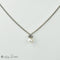 Collier Collier en or blanc 18 carats avec pendentif perle et diamants 58 Facettes 2251