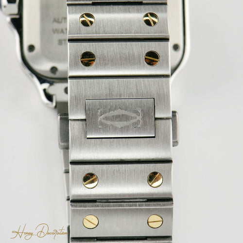 Montre Cartier Santos - Montre unisexe en or jaune 18K et acier, diamants 58 Facettes 2504