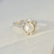 Bague 54 Bague vintage en or blanc 14 carats avec perle Mabe et diamants 58 Facettes