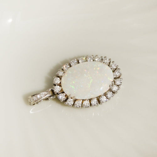 Pendentif Pendentif en platine avec boulder opale et diamants 58 Facettes 2842