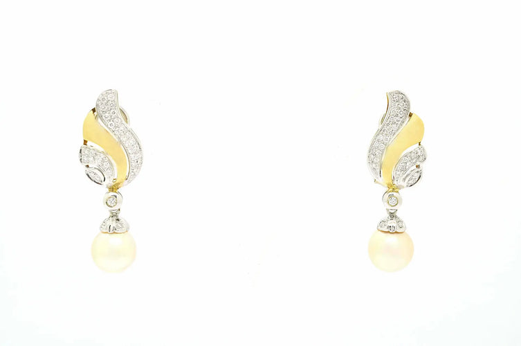 Boucles d'oreilles Boucles d’oreilles en or jaune et blanc 18 kt avec perles et diamants 58 Facettes 10693