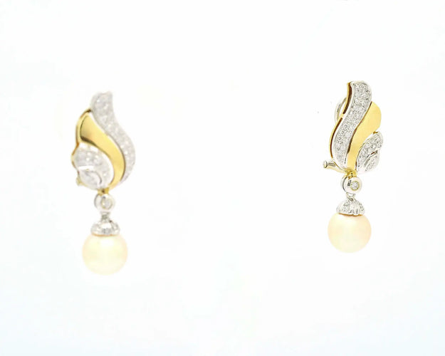 Boucles d'oreilles Boucles d’oreilles en or jaune et blanc 18 kt avec perles et diamants 58 Facettes 10693