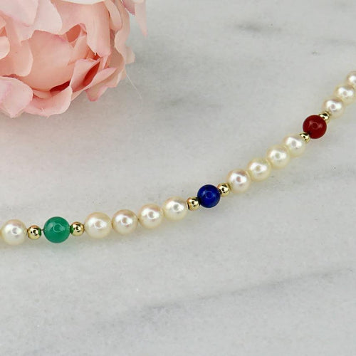 Bracelet Bracelet de perles en or 14 carats avec pierres fines 58 Facettes 2306