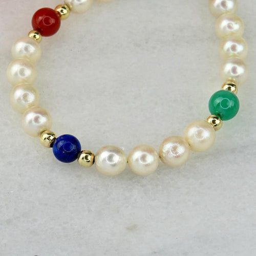 Bracelet Bracelet de perles en or 14 carats avec pierres fines 58 Facettes 2306