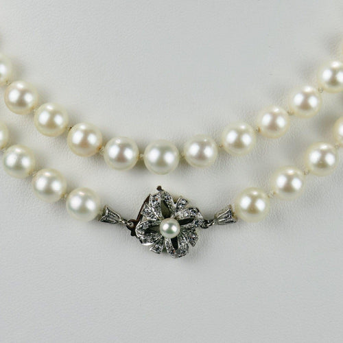 Collier Collier de perles Akoya - Fermoir bicolore en or 14 carats et diamants 58 Facettes 1998