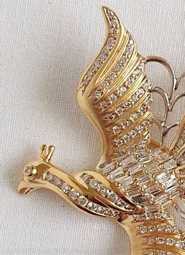 Broche Broche OISEAU DE PARADIS or jaune diamants 58 Facettes R 1137  MKEE